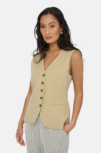 Blazer écru de JDY, avec fermeture à boutons et pantalon rayé.
