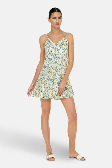 Blanc, chemisier sans manches court de ONLY®, avec un motif floral en jaune et vert.