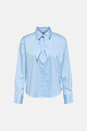 Chemise bleue à manches longues de JDY, avec fermeture boutonnée et manches bouffantes.