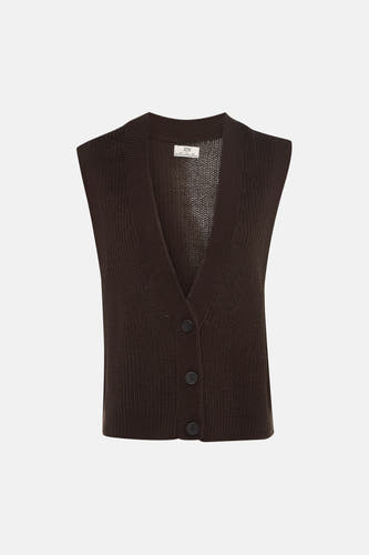 Débardeur marron de JDY, porté sur un col roulé beige et associé à un pantalon noir à jambes larges.
