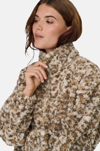 Beige korte jas van ONLY met een pluizige textuur en ritssluiting.
