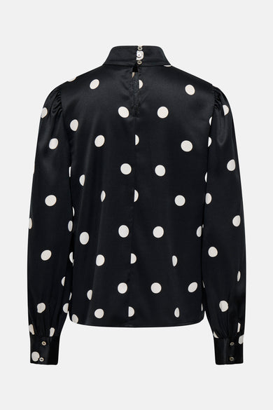Zwarte blouse met lange mouwen van ONLY, met witte stippen en een knoopsluiting aan de achterkant.
