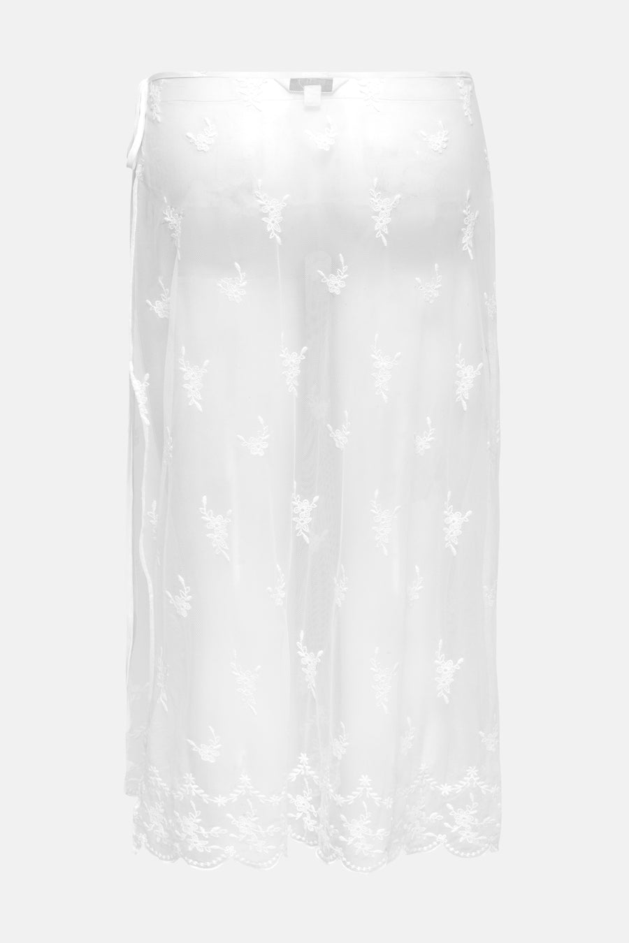 Jupe blanche ONLY, avec dentelle florale sur toute la surface et un ruban sur le côté.