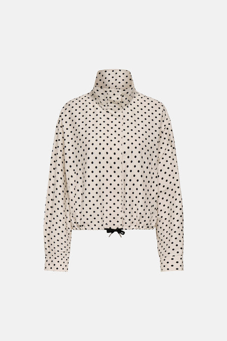 Veste courte blanche ONLY® à pois noirs, col montant et cordon de serrage à l'ourlet.