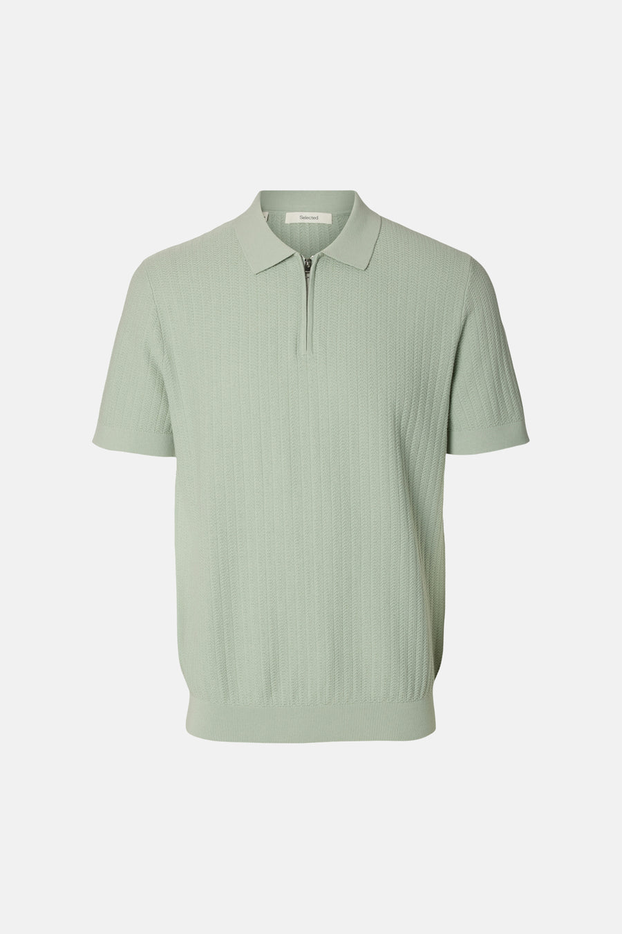 Polo verte SELECTED, à manches courtes et avec un subtil motif côtelé vertical.
