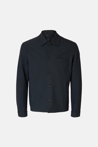 Blauw overhemd met lange mouwen van SELECTED, met een borstzak en knoopsluiting.
