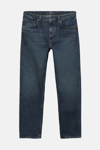 Slim jeans van donkerblauw denim van MANGO, met een klassieke pasvorm en subtiele details.
