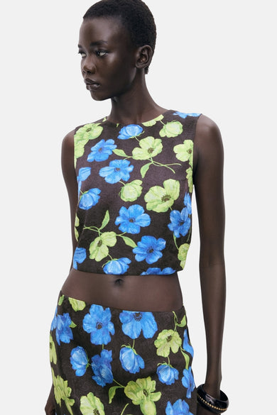 Mouwloze multicolor blouse van MANGO, met een bloemenprint in blauw en groen.
