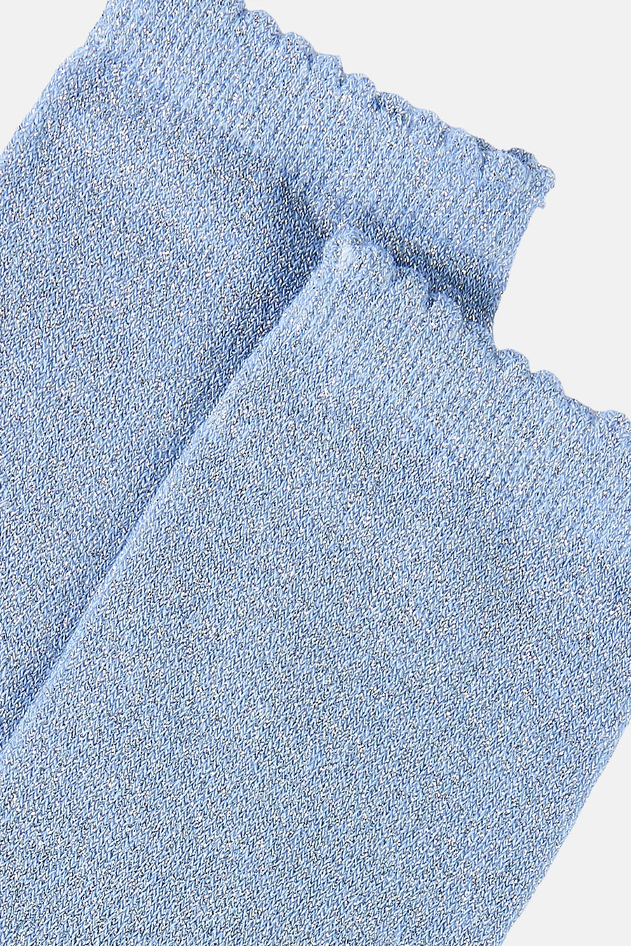 Blauwe sokken van PIECES® met subtiele glitters en een geschulpte rand.