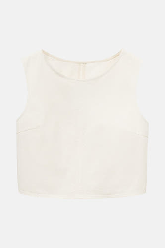Ecru mouwloze blouse van MANGO, met een effen patroon en subtiele details.