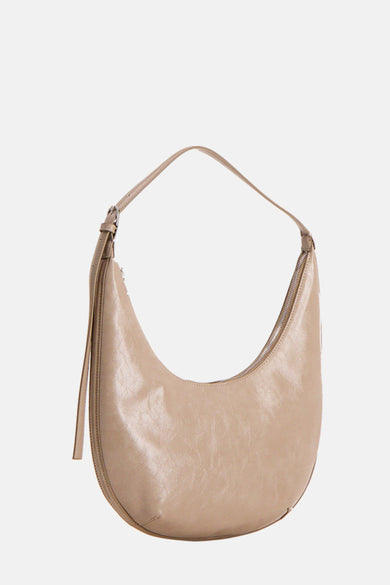 Beige schoudertas van MANGO, met een ritssluiting en verstelbare schouderband.
