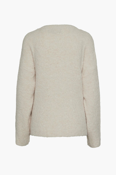 Ecru cardigan van PIECES® met lange mouwen en een zachte, gebreide textuur, gezien van achteren.
