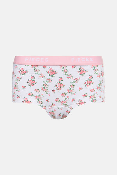 Shorty blanc de Pieces avec imprimé de fleurs roses et cordon élastique rose avec logo.