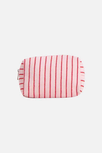 Trousse de toilette rose de PIECES® avec des rayures verticales rouges et une texture éponge, avec une fermeture éclair.