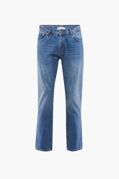 Blauwe tapered jeans van WOODBIRD met subtiele wassing en klassieke zakken.
