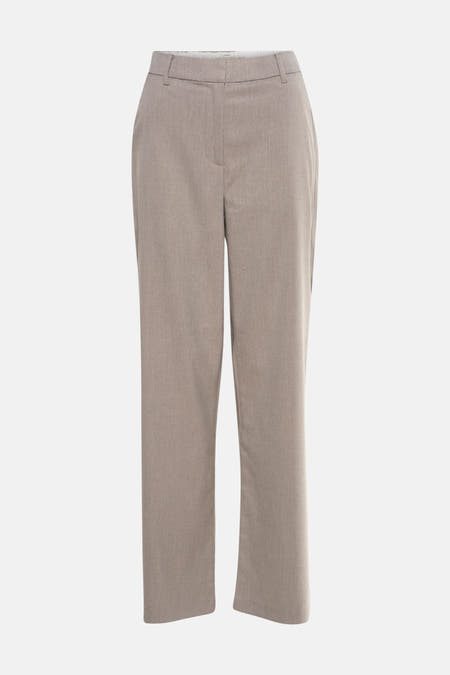 Pantalon beige de France, avec une texture lisse et des jambes droites.