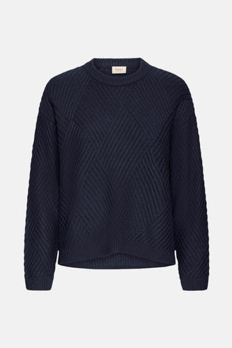 Sweat-shirt bleu marine avec col rond de France, doté d'un motif de poitrine unique en forme de sweat.