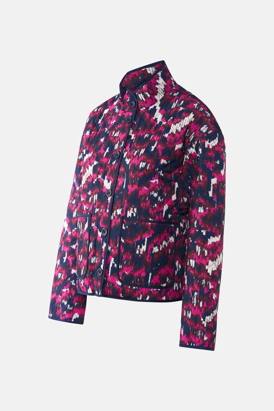 Manteau court multicolore de France, avec un motif zigzag abstrait et des détails bleu marine.
