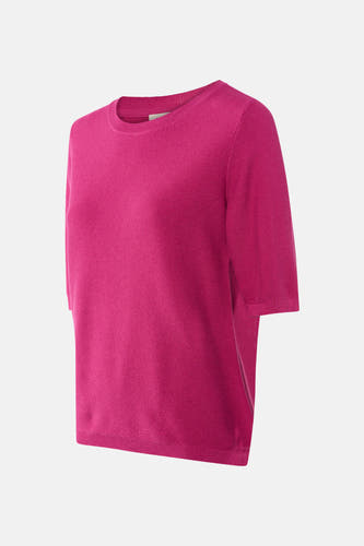 T-shirt rose avec col rond de France, à manches courtes et une fine structure en côtes.