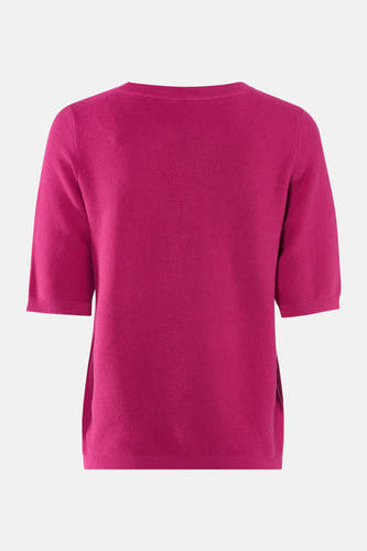 T-shirt rose avec col rond de France, à manches courtes et une fine structure en côtes.