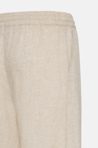 Pantalon marron de Fransa, avec une ceinture élastique et un détail de poche italienne.