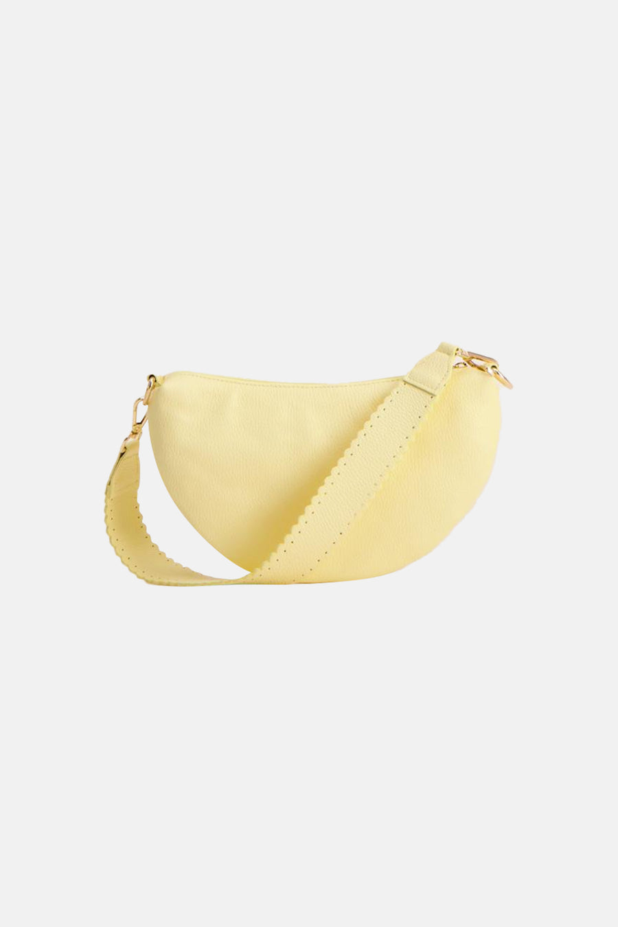 Gele crossbodytas van Access® met korrelige textuur, halvemaanvormig design en geperforeerde verstelbare band.
