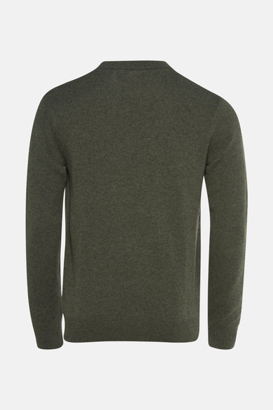 Donkergroene, gebreide trui.