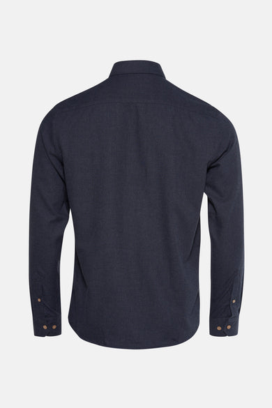 Chemise bleue à manches longues de SOLID, vue par derrière, avec des boutons sur les poignets.