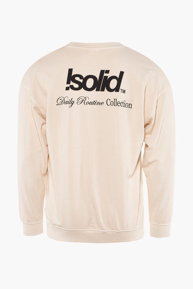 Beige sweater van SOLID met lange mouwen en zwarte tekst op de rug.