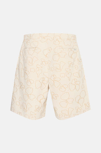 Beige short van SOLID, met een patroon van bloemcontouren.

