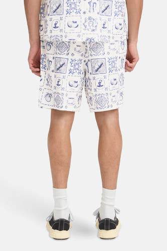 Chemise bleue à manches courtes de SOLID, avec un motif de carreaux et portée avec un short.