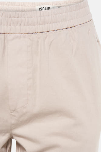 Pantalon écru de SOLID, avec ce taille élastique et une subtile texture.