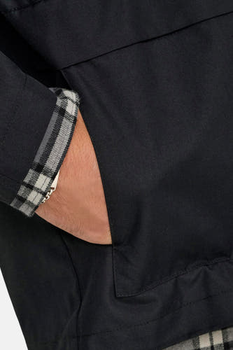 Manteau court noir d'ONLY & SONS, avec un motif de lunettes sur l'intérieur du manche et de la poche.