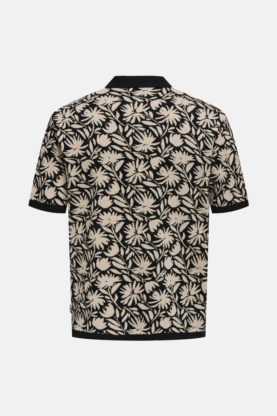 Poloshirt met bloemenprint, zwarte boorden.