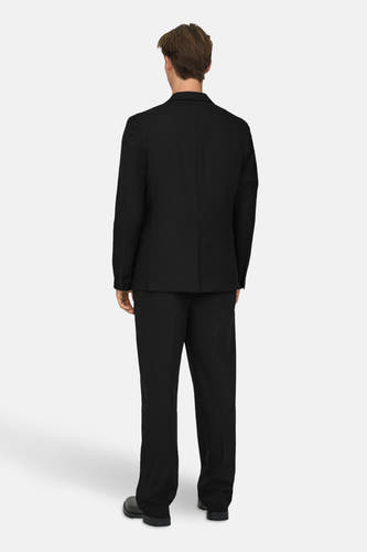 Pantalon noir de ONLY & SONS, vu de derrière, avec des chaussures noires.