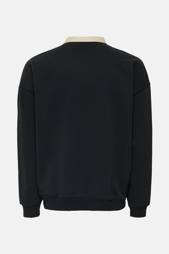 Gilet noir d'ONLY & SONS, avec des manches longues et un col beige, vu de dos.
