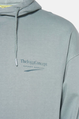 Pull-over bleu avec capuche de THEJOGGCONCEPT, avec cordon et impression textuelle.