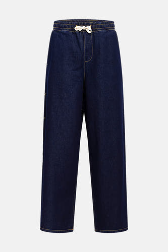 Donkerblauwe, wijde jeans van REDEFINED REBEL, met een elastische tailleband en een witte trekkoord.
