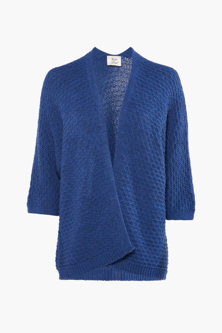 Blauwe cardigan van Terra di Siena, met een openvallend model en een fijn gebreide textuur.
