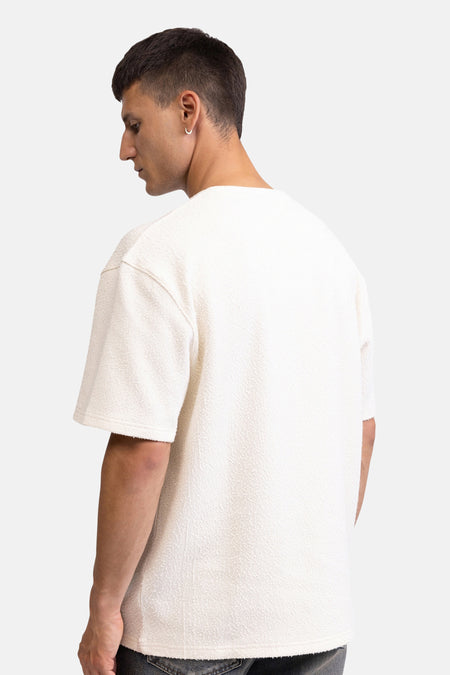 Ecru korte mouw t-shirt van REDEFINED REBEL, textuurrijke stof, achterzijde, model in profiel, casual fit