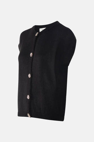 Zwart vest van Terra di Siena met sierknopen, vanuit een schuin perspectief gefotografeerd.
