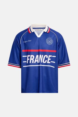 Blauwe polo van REDEFINED REBEL met witte en rode accenten, FRANCE print en logo, front view