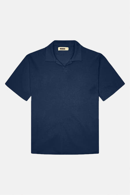 Blauwe polo met korte mouwen van WOODBIRD, effen stof met open kraag.