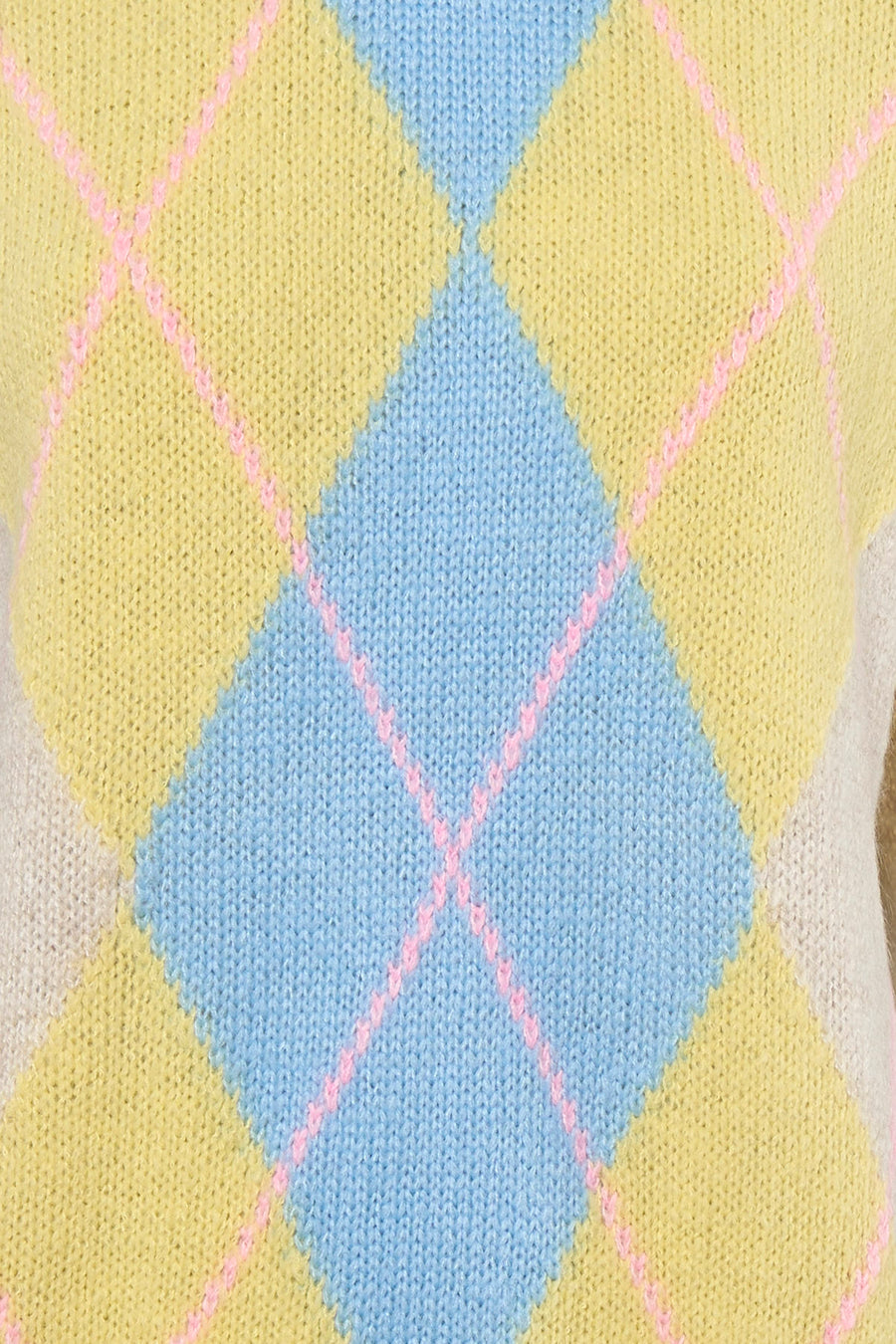 Beige gilet zonder mouw van Terra di Siena, met ruitpatroon in blauw en geel met roze lijnen.
