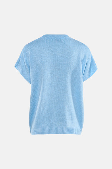 Gilet court sans manches bleu de Terra di Siena, avec une texture tricotée.