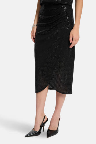 Zwarte rok van Morgan De Toi, met subtiele glitters en een elegante overslag.