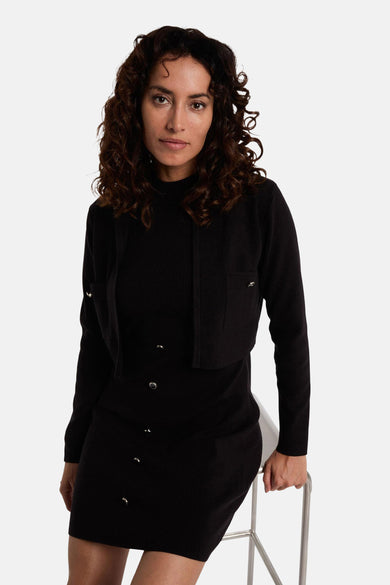 Robe noire à longues manches de Morgan De Toi, avec des détails de boutons à l'avant.