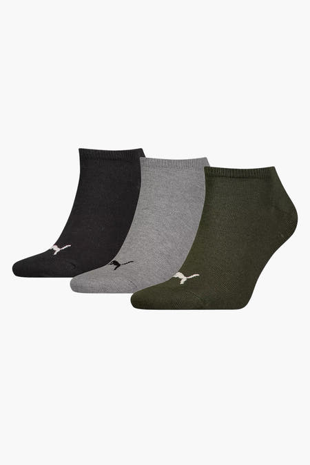 Groene sokken van PUMA, met een geborduurd logo op de enkel en ribbels.