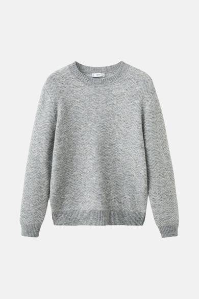 Sweat-shirt gris à col rond de MANGO, avec un motif rayé subtil et des manches longues.