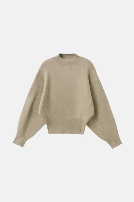 Zandkleurige trui met lange mouwen.